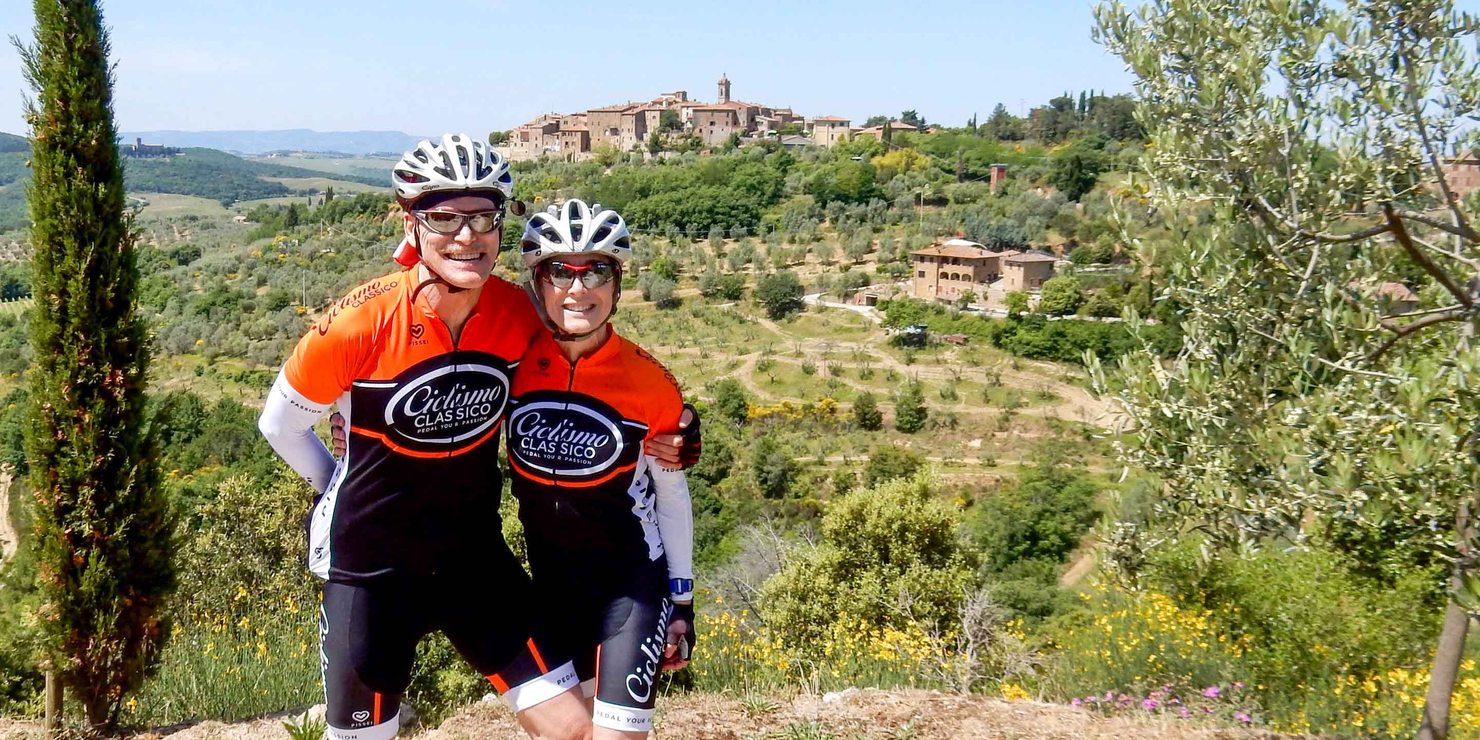 Biker couple smiling in Toscana Verde