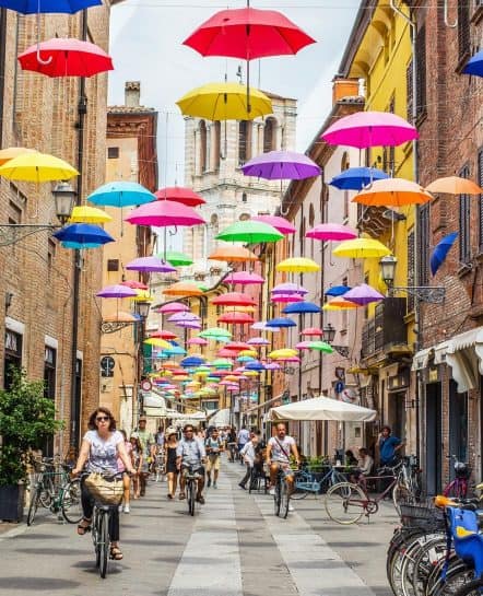 Venetian street with umbrellas hanging