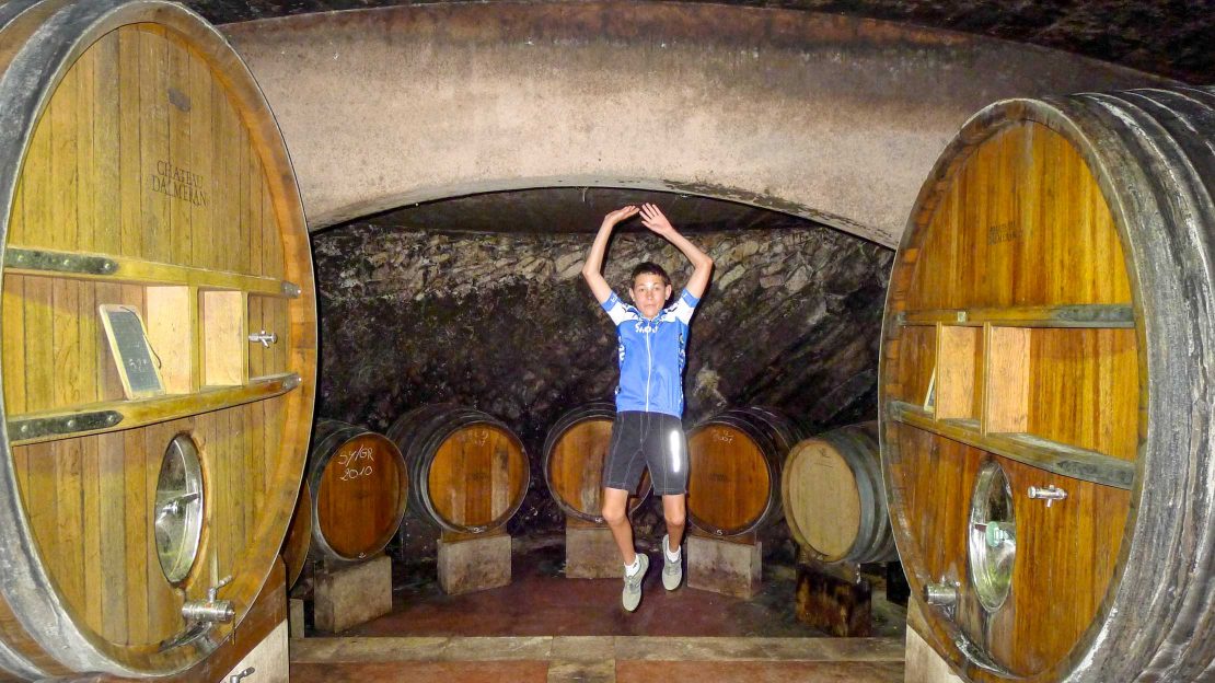 Person in a wine cellar on the Provence Pour La Famille tour